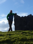 FZ025986 Marijn leaning against Carreg Cennen Castle.jpg